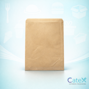 Selection of flat brown kraft paper bags in various sizes for eco-friendly retail packaging