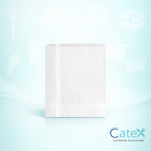 Stack of clean white sulphite paper bags 10 x 12 inch for bakery and retail use